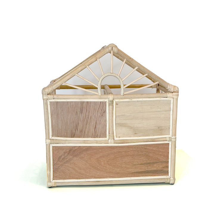 rear view of rattan doll house with attic