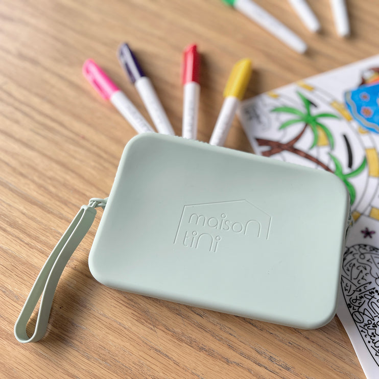 The muted mint zipped silicone pouch with handle for the UAE silicone placemat and the markers