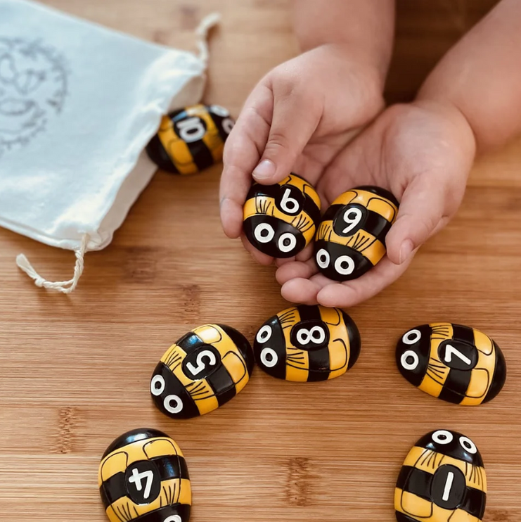 sensory play bees stones black & yellow