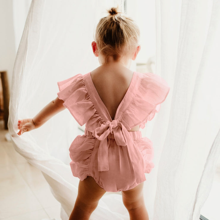 bow-tied linen romper