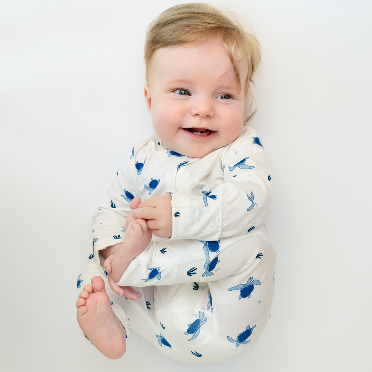 white with blue turtle print zippie bamboo babies 