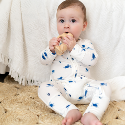 white with blue turtle print zippie