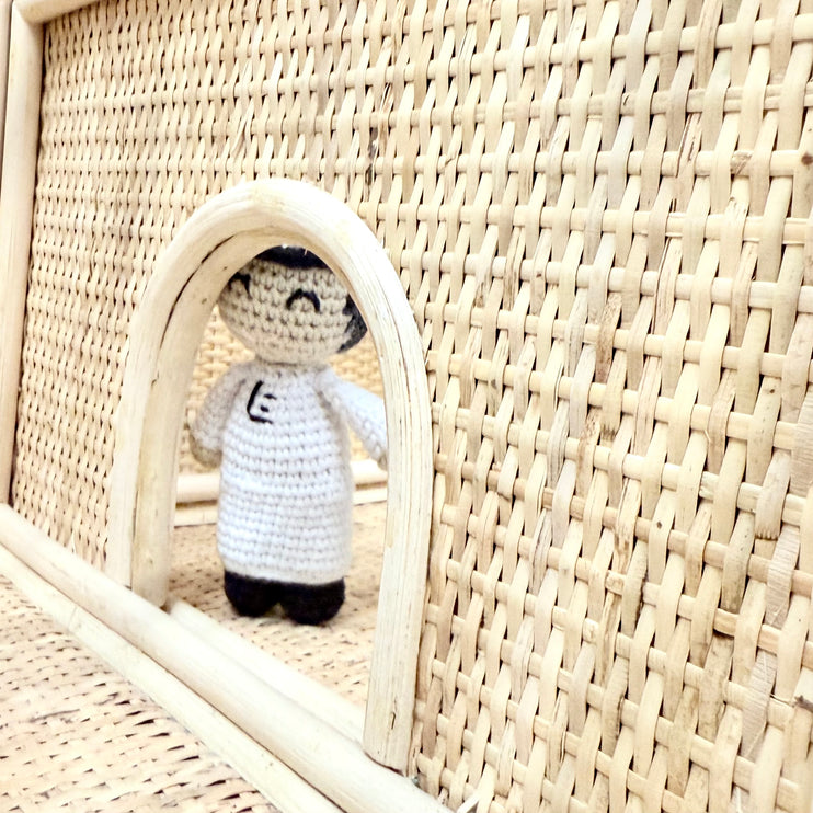 mini crochet doll of boy in white kandoura